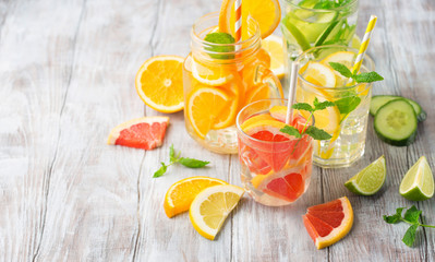 Infused water with fresh citrus fruits and ice