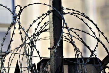 Do not cross, Military area. Barbed wire.