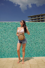 Canvas Print - Young woman enjoying a sun