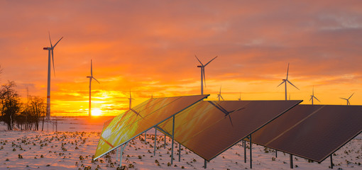 Wall Mural - solar panels and wind turbines working in winter
