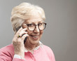 Happy senior lady talking on the phone