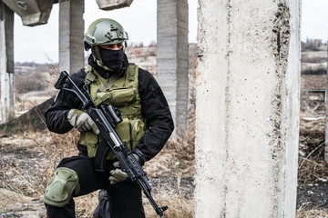 SWAT anti terrorist soldier special police force holding the rifle on the mission battle