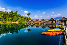 Floating Bungalows With Kayaks At Khao Sok National Park, Cheow Lan Lake, Thailand