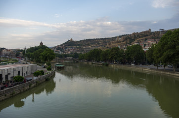 View from the Bridge of Peace in Tbilisi, a pedestrian bridge over the Mtkvari River in Tbilisi, Georgia