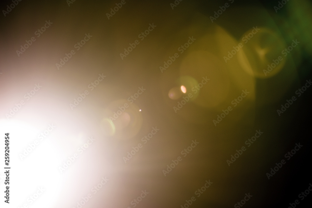 Flash of a distant abstract star. Abstract sun flare. The lens flare is subject to digital correction. - obrazy, fototapety, plakaty 