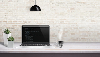 Fototapete - Development studio concept. Laptop with script code. Free space for text beside.