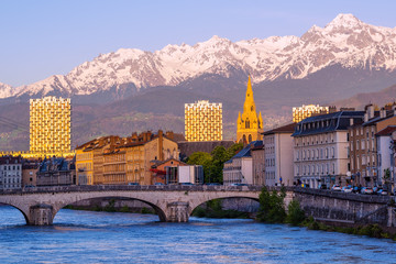 Wall Mural - Grenoble, France, historical city center and Alps mountains
