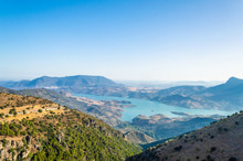 The Lake Of Zahara De La Sierra Between The Mountains, Landscape Of Andalusia, Spain