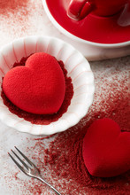 Red Heart-shaped Valentine Cake On The Dining Table