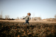 © Kim Swain/Stocksy - toddler boy running