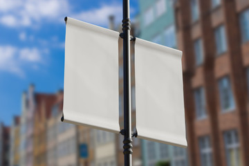 Wall Mural - 3D rendering of blank flag banner (empty advertisement) with clouds. Empty mockup template