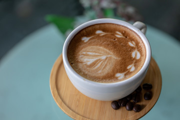 Backgrounds of Latte coffee, Coffee cup latte art in shop.