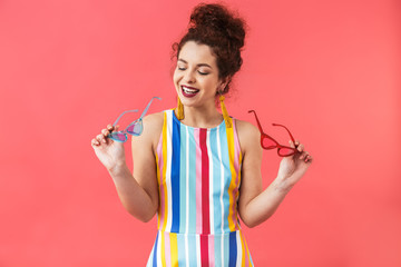 Portrait of a cheerful young woman wearing dress