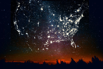 Forest sunset landscape with projection of USA map in the form of stars of the constellations of city lights. Travel United States of America concept. Elements of this image furnished by NASA.