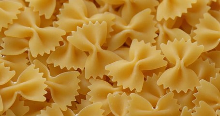 Canvas Print - Pile of Dry uncooked farfalle