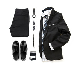 Wall Mural - Men's black clothing set with loafer shoes , watch, sock, bracelet, trousers, office shirt, tie and suit isolate on a white background, Top view