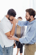 © LIGHTFIELD STUDIOS - selective focus of man consoling upset man during therapy meeting