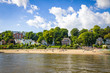 Summer view of the beach (Strand Oevelgoenne) on the Elbe river in Oevelgoenne district of Hamburg city, Germany.