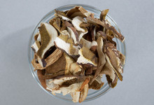 Top View Of Lot Of Slices Of Dry Brown Mushroom Boletus Edulis