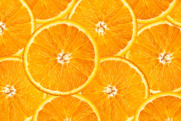 Wall Mural - Background of half cut oranges on orange background