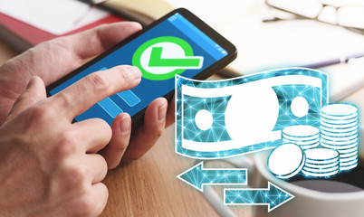 Aufkleber - Using smartphone for online payment and money transfer.Closeup of male hands touching smartphone screen for using app at table.