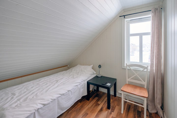 Wall Mural - Interior bedroom roof tilted with curtain window