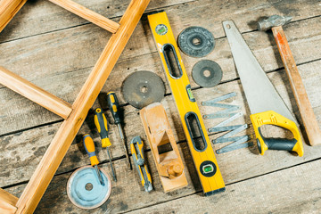 Wall Mural - Working tools on wooden rustic background.