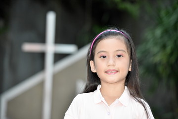 Smiling Diverse Girl And Cross