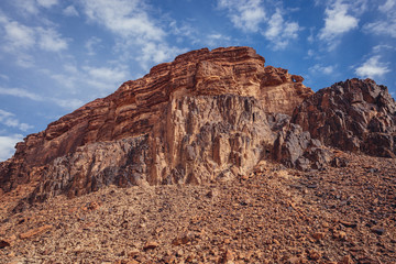 Poster - Rocky mountain seen from a path to so called Lawrence Spring in famous Wadi Rum - Valley of Sand in southern Jordan