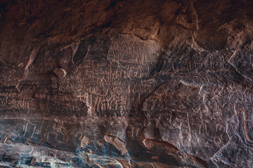 Poster - Walls covered with ancients drawings in Khazali gorge in famous Wadi Rum - Valley of Sand in southern Jordan