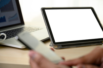 Poster - man  hands multitasking man using tablet close up close up working in office