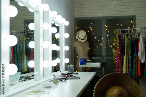 Decorative Cosmetics And Tools On Dressing Table With Bright