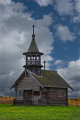 Wall Mural - Russia. Karelia. Ancient Orthodox Church on the shore of lake Ladoga, built of wood without a single nail