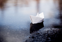 Paper Boat On Water