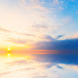 © Sky Stock - Background sky during sunset and water reflections.