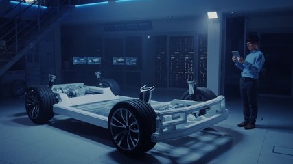 Poster - Automobile Engineer Working on Electric Car Chassis Platform, Using Tablet Computer Augmented Reality with 3D CAD Software Modelling. Innovative Facility: Vehicle Frame with Wheels, Engine, Battery