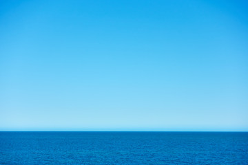 Wall Mural - Blue sea with clear sky