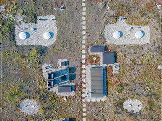 Wall Mural - Aerial view of roof with ventilation equipment in urban environment