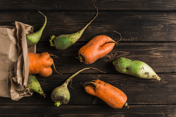 Ugly vegetable green radish and carrot