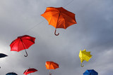 Fototapeta Uliczki - Colored umbrellas floating in the sky