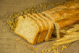 Fototapeta Kuchnia - fresh bread, wheat ears and grains