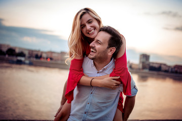 Wall Mural - Loving couple by the river