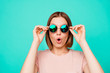 Close up photo beautiful funny funky her she lady hold hands arms dark sunglass look flying airplane first time wonderful sight wear casual pastel t-shirt clothes isolated teal turquoise background