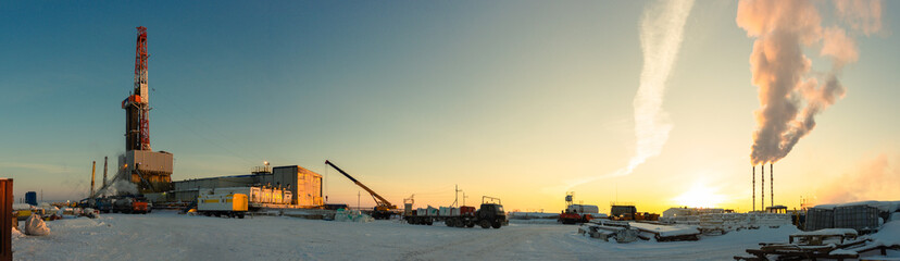 Wall Mural - drilling rig on land winter morning panorama work on well cementing