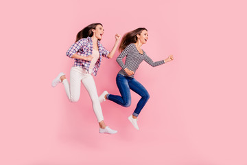 Sticker - Full length body size photo of active excited teenagers teens funny funky fooling careless having stroll moving quick wearing jeans checkered blouses isolated on pink background