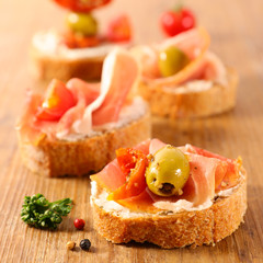 Wall Mural - tapas, canape with cheese and ham