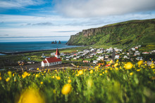 Beautiful Town Of Vik I Myrdal In Iceland In Summer. The Village Of Vik  Is The Southernmost Village In Iceland On The Ring Road Around 180 Km Southeast Of Reykjavík.