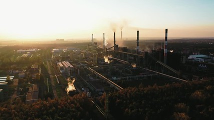 Wall Mural - industrial landscape with heavy pollution produced by a large factory