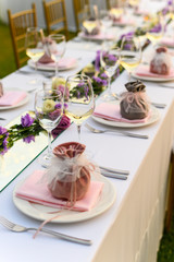 Table setting at a luxury wedding and Beautiful flowers on the table.