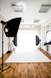 © smspsy - Empty photo studio with lighting equipment